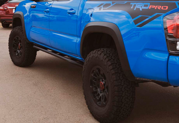 Trail Edition Rock Sliders - Double Cab Long Bed Kick Out Raw — 05-23 Toyota Tacoma